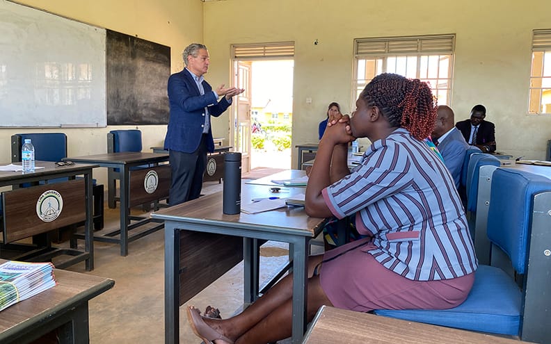 Pippenger speaking to a classroom of students