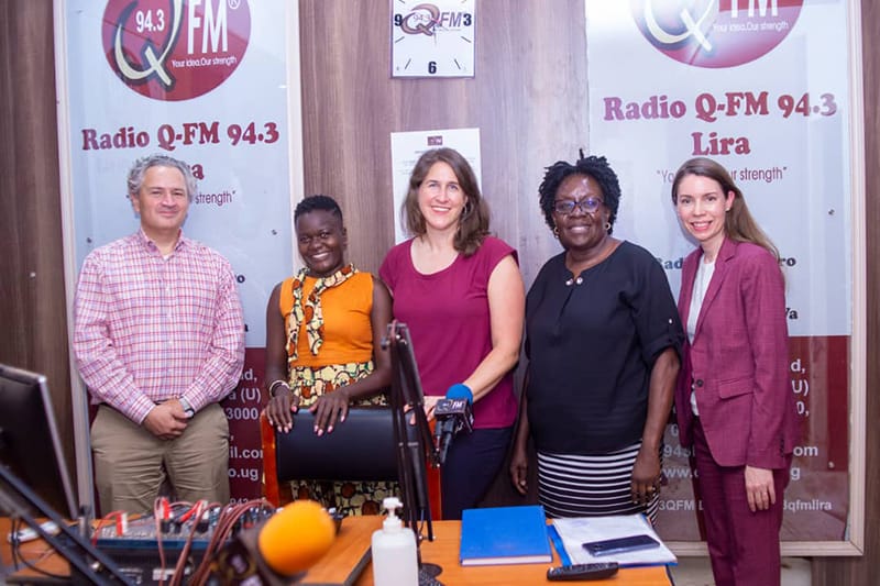 Pippenger standing with his radio host, Dorothy Ngalonbi, Sarah Boeving, and Amy Peterson