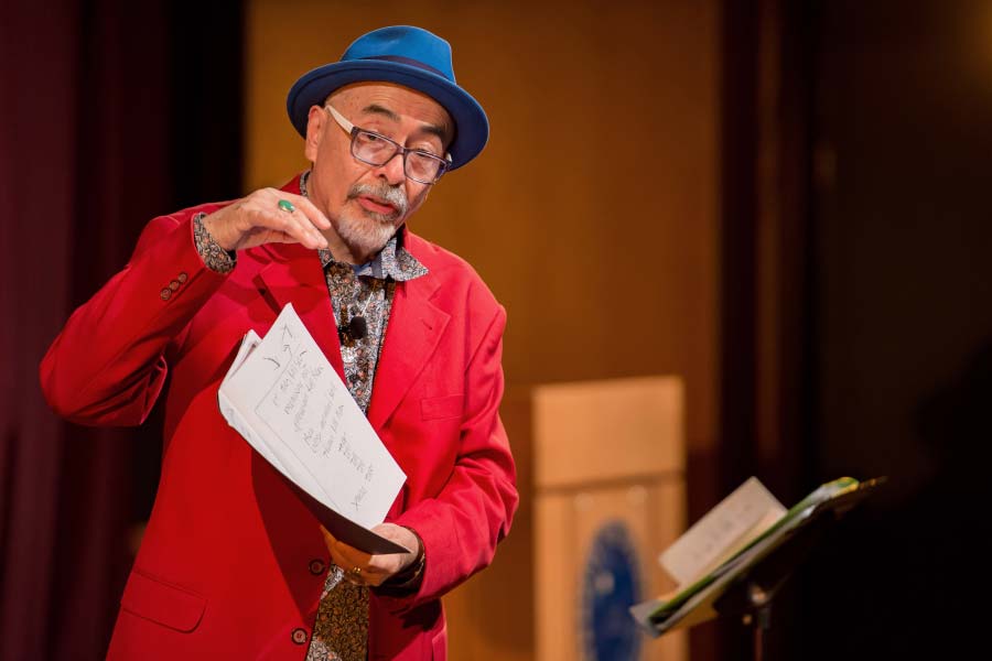 Juan Felipe Herrera takes questions from the audience following a reading of his poetry in the Decio Theater at the DeBartolo Performing Arts Center.