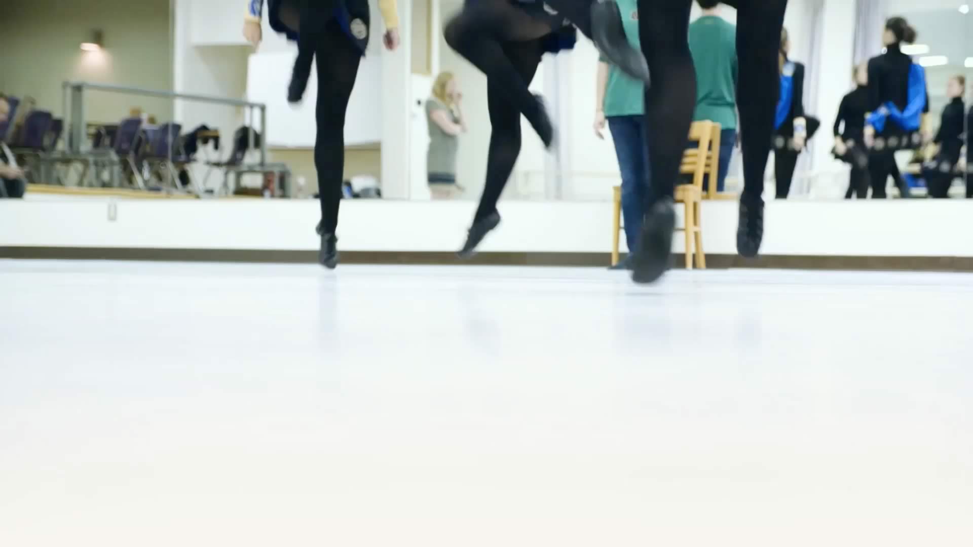 A low view of dancers feet