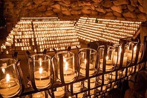 Candles lit at the Grotto.