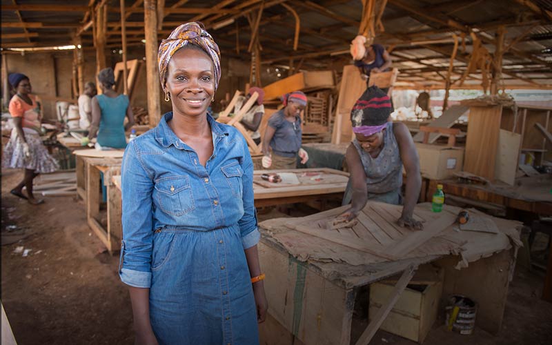 YALI fellow Evelyn Zalwango owner of Awaka Furniture poses for a photo.