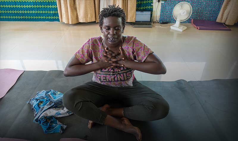 YALI fellow Mildred Apenyo, owner of Fit Clique, a gym that provides classes in strength training, African yoga, dance, and self-defense in Kampala, Uganda.