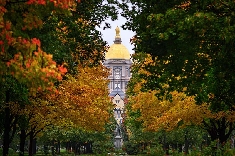 Main Building through color fall foliage.